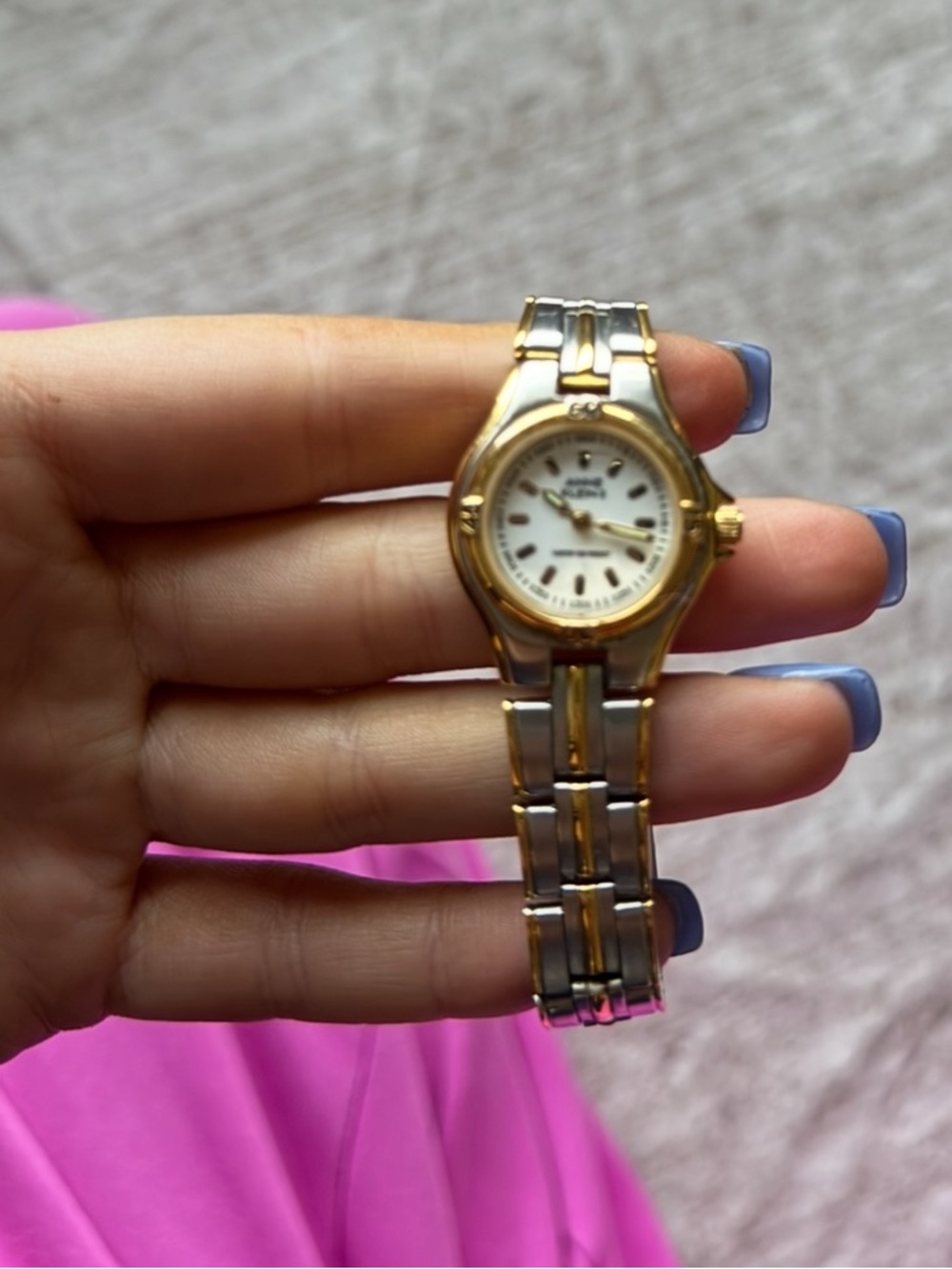 Anne Klein Two-Tone Gold and Silver Bracelet Watch
requires a battery